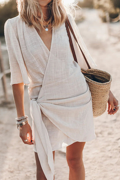 Asymmetrical Hem Wrap Mini Dress