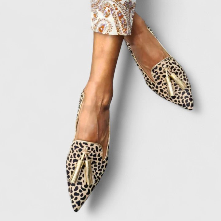 Pointed Leopard Print Loafers with Vibrant Pink Tassels